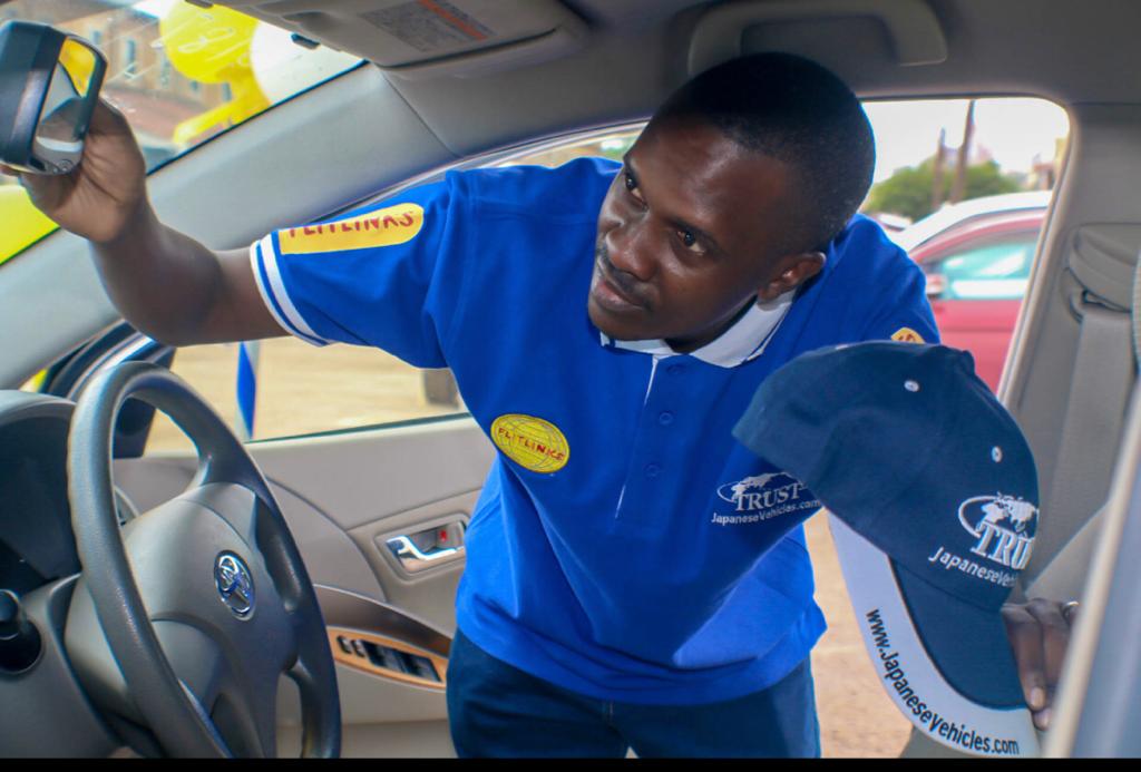 FLITLINKS INTERNATIONAL & TRUST JAPANESE VEHICLES DELIVER CAR TO PROMO WINNER MR LUCIANO SSAKU IN KAMPALA